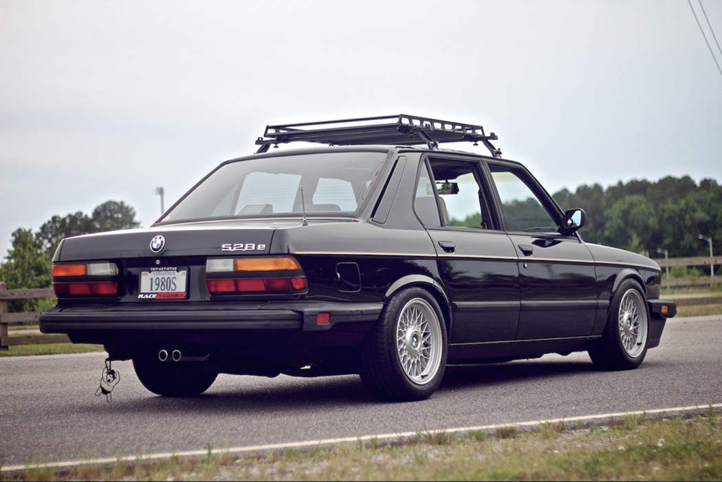 BMW E28 Euro vs US bumpers showcasing the difference in size and style