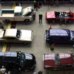 Classic car auction scene, representing the passion for vintage vehicles