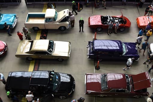 Classic car auction scene, representing the passion for vintage vehicles