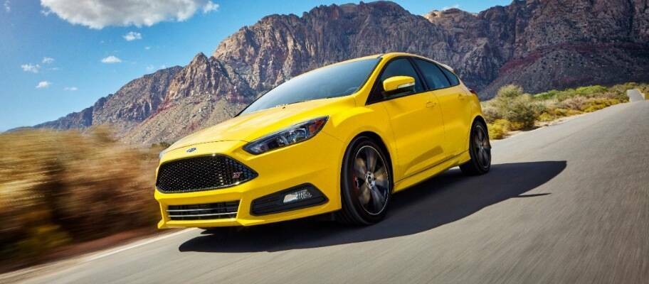 Ford Focus ST car parts displayed on a red performance hatchback