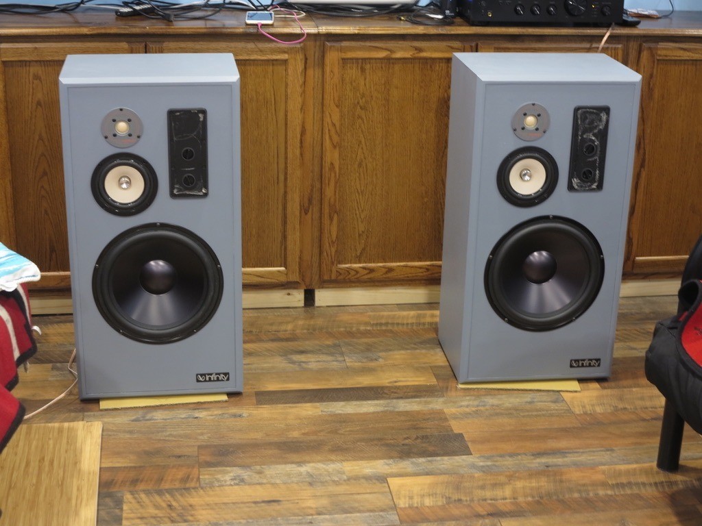 Finished pair of restored Infinity SM120 speakers, presenting their completed and upgraded appearance.